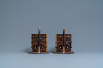 A pair of rectangular Chinese three-tiered hongmu wooden covered boxes, 19th C.