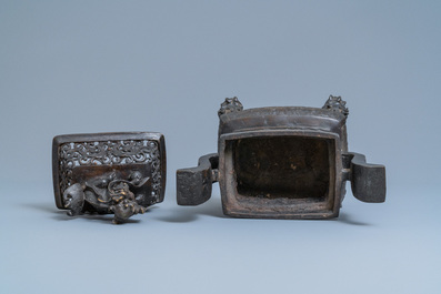 A large Chinese bronze censer and cover, Ming