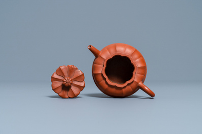 A Chinese Yixing stoneware chrysanthemum-shaped teapot and cover, Yongzheng/Qianlong