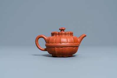 A Chinese Yixing stoneware chrysanthemum-shaped teapot and cover, Yongzheng/Qianlong