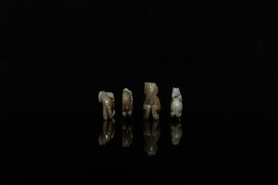 Four Chinese celadon and russet jade carvings with horses and monkeys, 19th C.