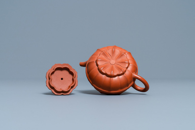 A Chinese Yixing stoneware chrysanthemum-shaped teapot and cover, Yongzheng/Qianlong