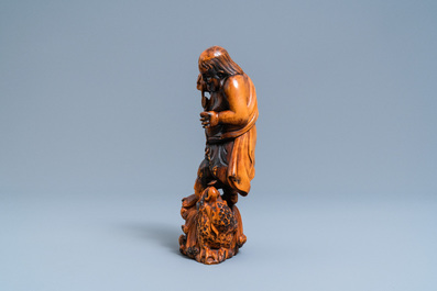 A Chinese carved boxwood figure of Liu Hai, Qing