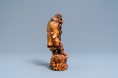 A Chinese carved boxwood figure of Liu Hai, Qing