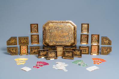 A Chinese Canton export gilt and lacquer gaming box with mother-of-pearl accessories, 19th C.