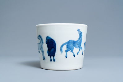 A Chinese blue and white 'Eight horses of Mu Wang' jardini&egrave;re, Qianlong mark, 19th C.