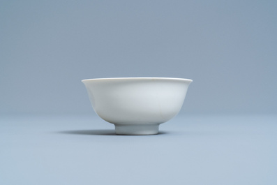 A Chinese monochrome white-glazed anhua-decorated 'dragon' bowl, Yongzheng mark and of the period