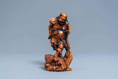 A Chinese carved boxwood figure of Liu Hai, Qing