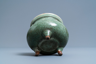 A Chinese monochrome celadon and crackle-glazed tripod censer, Ming