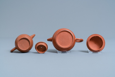 Five Chinese Yixing stoneware teapots and covers, 19th C.