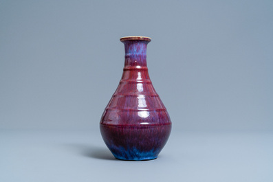 A Chinese flamb&eacute;-glazed bottle vase, Yongzheng mark, 19th C.