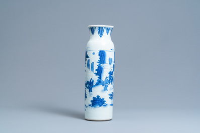 A Chinese blue and white rouleau vase with figures in a landscape, Transitional period