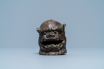 A Chinese lacquered bronze 'Buddhist lion' censer and cover, Ming