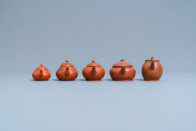 Five Chinese Yixing stoneware teapots and covers, 19th C.