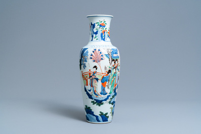 A Chinese wucai vase with continuous figurative design, 19th C.