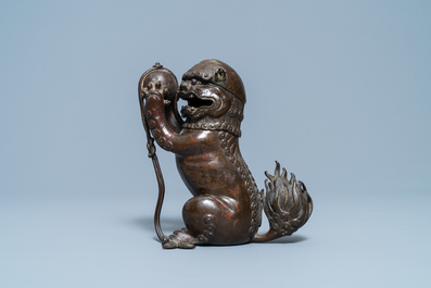 A Chinese lacquered bronze 'Buddhist lion' censer and cover, Ming