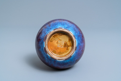 A Chinese flamb&eacute;-glazed bottle vase, Yongzheng mark, 19th C.