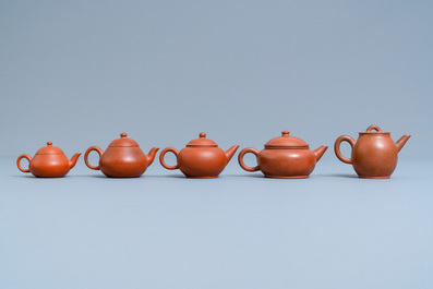 Five Chinese Yixing stoneware teapots and covers, 19th C.