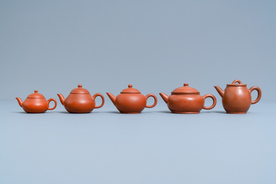 Five Chinese Yixing stoneware teapots and covers, 19th C.