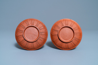 A pair of Chinese Yixing stoneware dishes with applied design, Kangxi