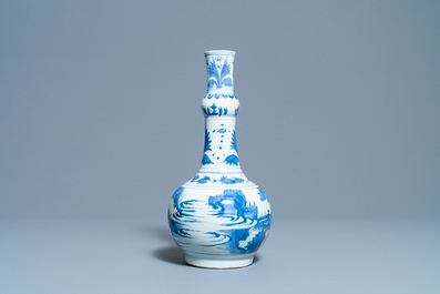 A Chinese blue and white bottle vase with figures in a landscape, Transitional period