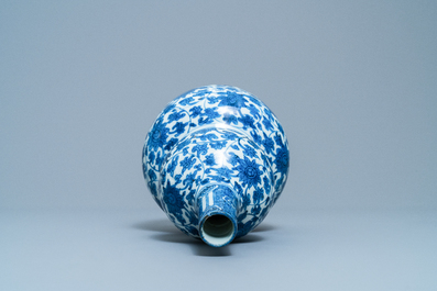 A Chinese blue and white 'lotus scroll' double gourd vase, Wanli