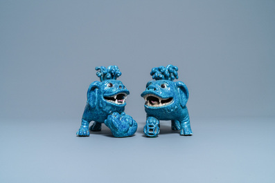 A pair of Chinese robin's egg-glazed models of Buddhist lions, 19th C.