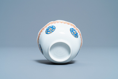A Chinese famille rose 'Liu Hai' cup and saucer, Yongzheng