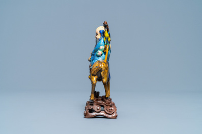 A Chinese enamelled silver figure of Shou Lao on a deer, 19th C.