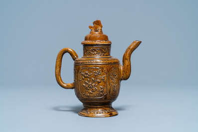 A Chinese brown-glazed relief-decorated teapot and cover, 18/19th