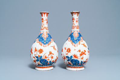 A pair of ribbed Dutch Delft dor&eacute; vases, 18th C.