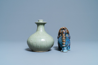 A Chinese celadon-glazed kendi and a Shiwan flamb&eacute;-glazed beast-shaped censer, 18/19th C.