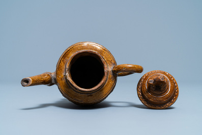 A Chinese brown-glazed relief-decorated teapot and cover, 18/19th