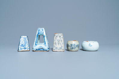 Five Chinese blue and white scroll weights, Ming/Qing