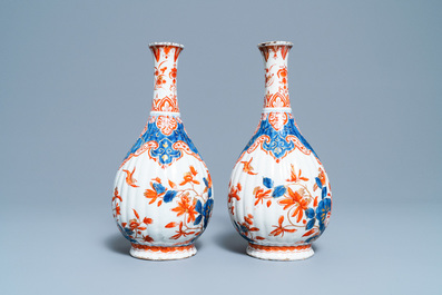 A pair of ribbed Dutch Delft dor&eacute; vases, 18th C.