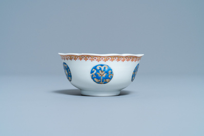 A Chinese famille rose 'Liu Hai' cup and saucer, Yongzheng