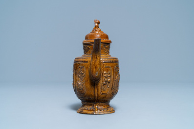 A Chinese brown-glazed relief-decorated teapot and cover, 18/19th