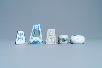 Five Chinese blue and white scroll weights, Ming/Qing