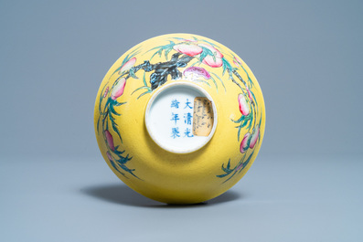 A Chinese famille rose yellow-ground 'nine peaches' bowl, Guangxu mark and of the period