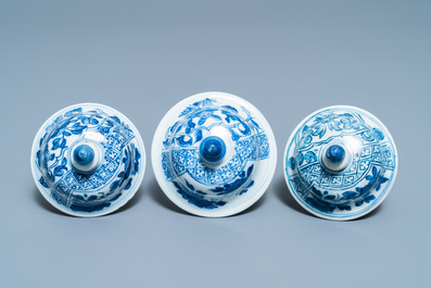A Chinese blue and white garniture of five vases, Kangxi