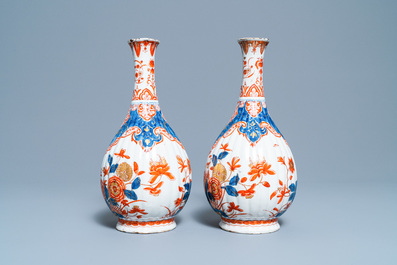 A pair of ribbed Dutch Delft dor&eacute; vases, 18th C.