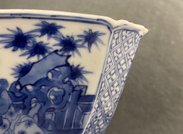 A Chinese blue and white bowl with a lady with cat, Kangxi mark and of the period