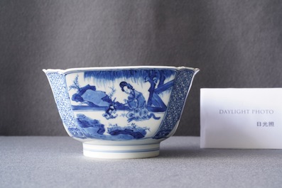 Un bol en porcelaine de Chine en bleu et blanc figurant une dame et son chat, marque et &eacute;poque de Kangxi