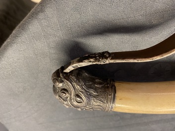 A Chinese or Vietnamese silver, tie li mu wood and bone sword, 19th C.