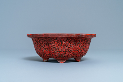 A Chinese carved cinnabar lacquer jardini&egrave;re, Yongzheng/Qianlong