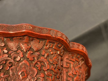 A Chinese carved cinnabar lacquer jardini&egrave;re, Yongzheng/Qianlong