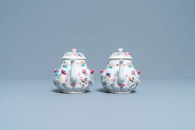 A pair of Chinese famille rose relief-decorated teapots and covers, Yongzheng