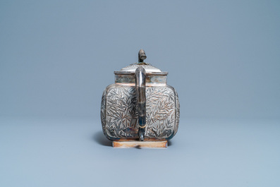 A large Chinese silver teapot and cover, 19th C.