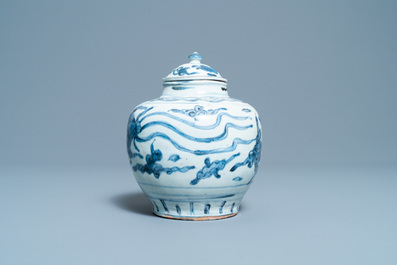 A Chinese blue and white 'phoenix' vase and cover, Ming