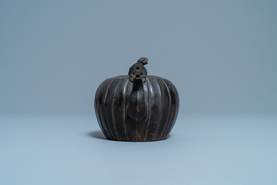 A Chinese lacquered bronze teapot and cover, Yuan